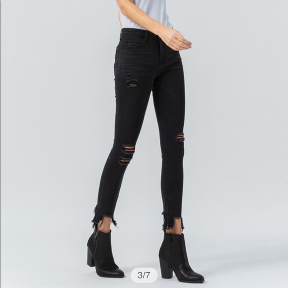 Midrise distressed shark bite skinny black jean - Picture 2 of 7